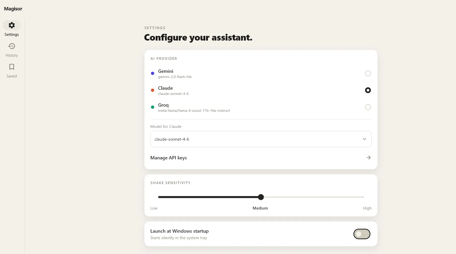 The Settings screen with provider picker, model selector, and shake sensitivity slider